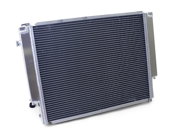 This is a 100% aluminum dual core lightweight radiator with aluminum end  tanks and fan/shroud kit. It can also accept aftermarket fans. It is  designed to replace the OEM radiator for the